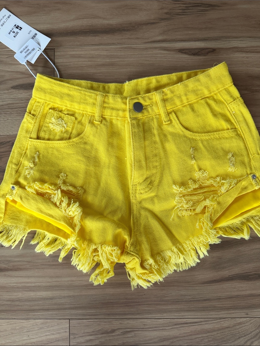 Women’s Yellow Distressed Denim Shorts